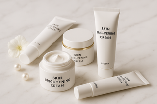 What are the active ingredients commonly used in skin whitening creams?